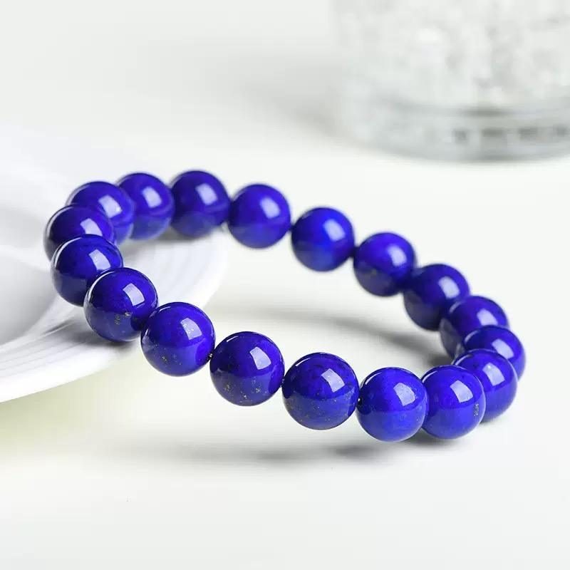 Natural Lapis Lazuli Round Bead Bracelet For Intuition And Calm Mind — styled